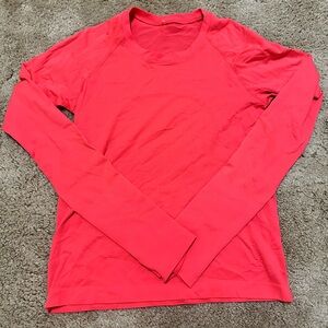 Bright red Lululemon long sleeve swiftly tech. Size 6